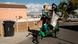 An employee of recycling startup Regenize collects recyclable trash using a delivery tricycle in a Cape Town suburb. 