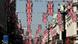 Union flag buntings hang across Regent Street in London